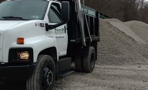MULCH, TOPSOIL AND STONE DELIVERY. Lammon Brothers owns and operates our own fleet of delivery dump trucks, giving us the ability to service customers promptly and efficiently. We can deliver landscape products in amounts from a few cubic yards up to full dump truck loads. Delivery costs are based on the mileage associated with each delivery.